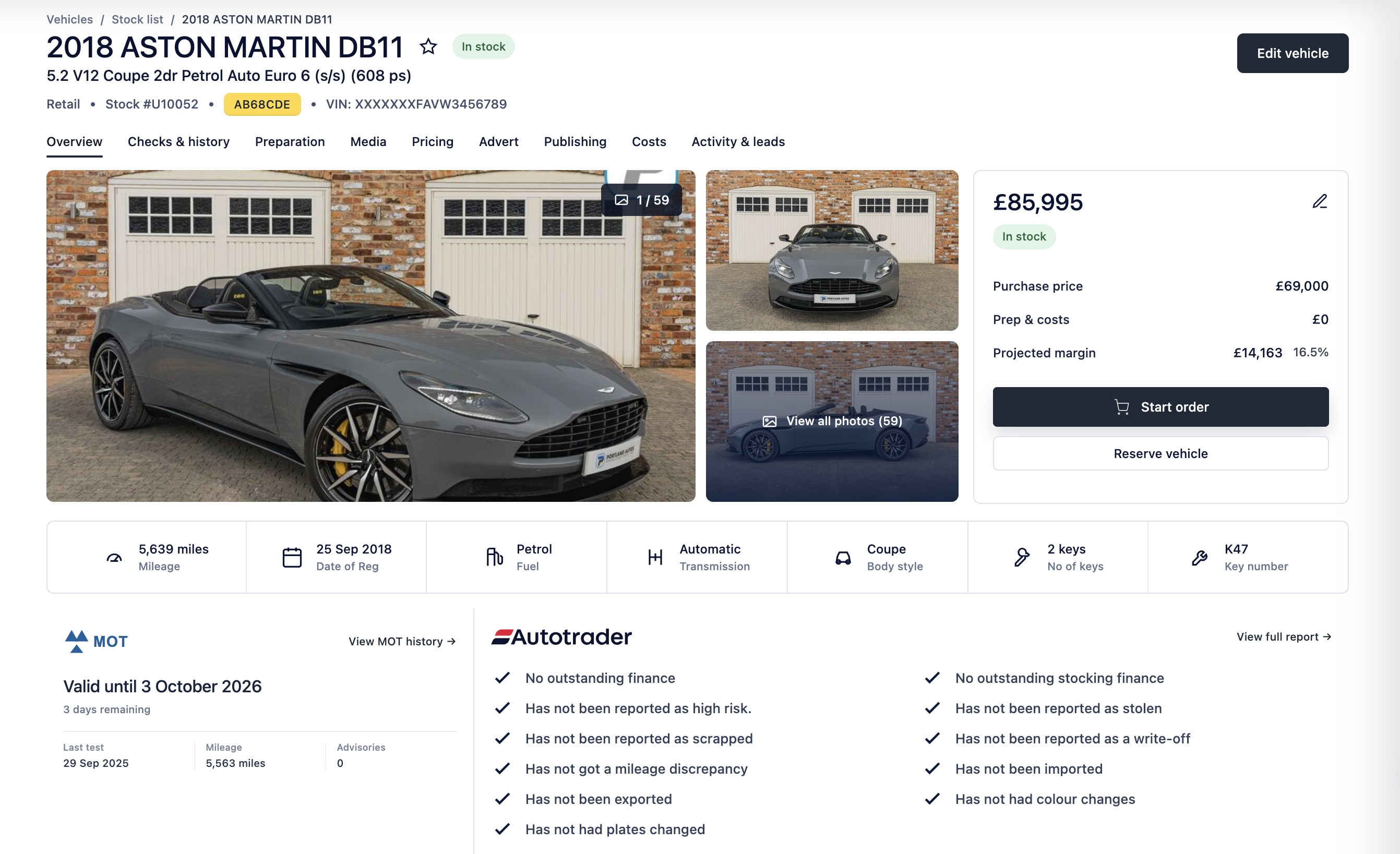 DealerStack vehicle overview for an Aston Martin DB11 with stock, pricing, margin, MOT and provenance information