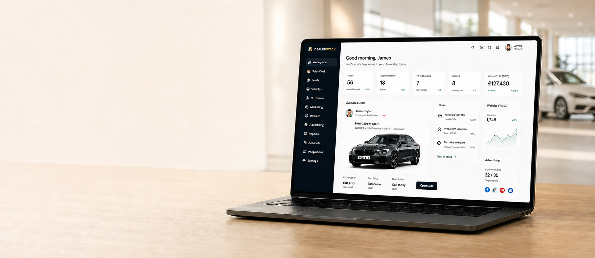 DealerStack Workspace shown on a laptop in a car showroom